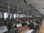 Inside the Boott mill with the clattering looms running themselves