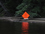 A freak accident sets a road sign on the Merrimack River